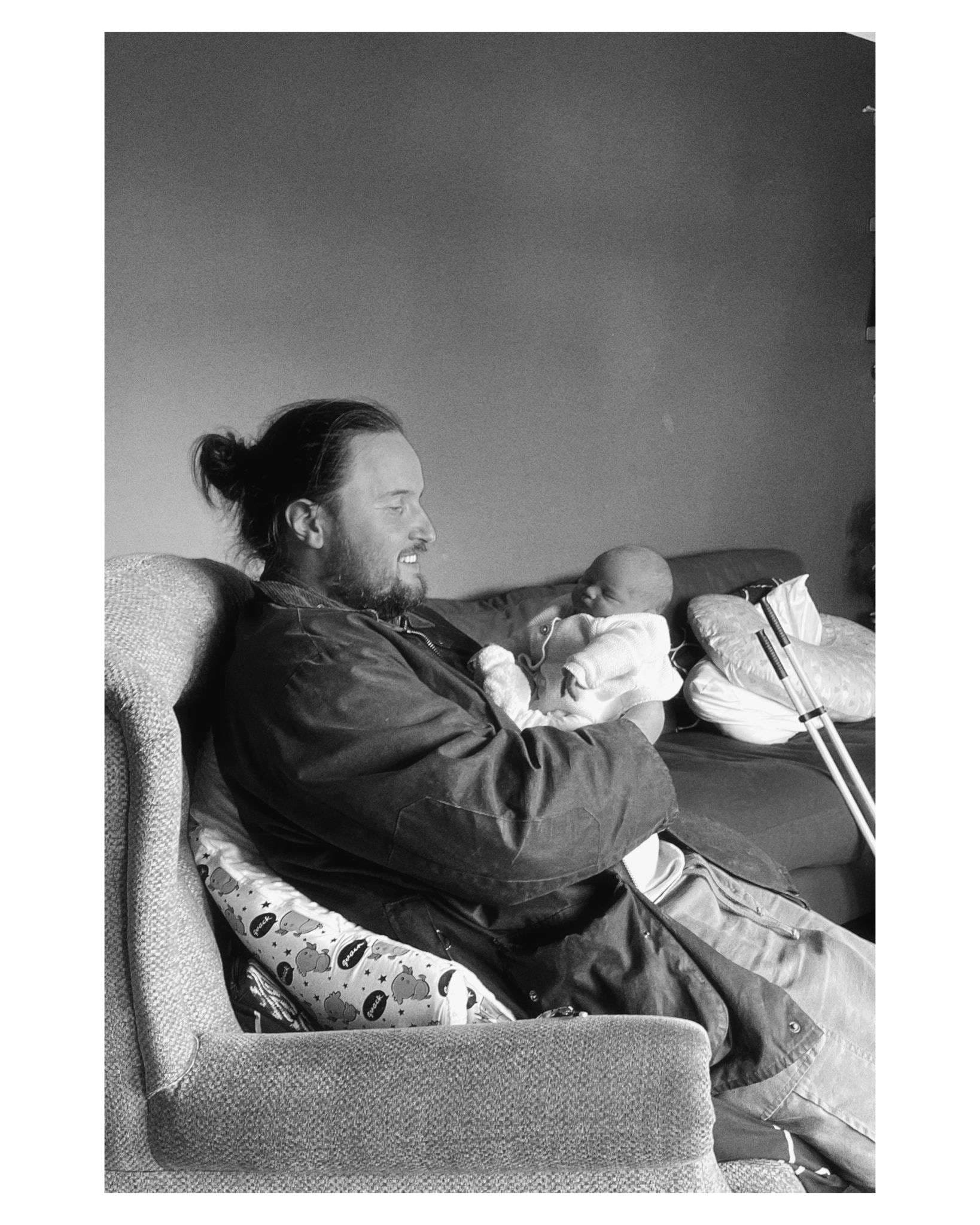 Father holding a newborn baby